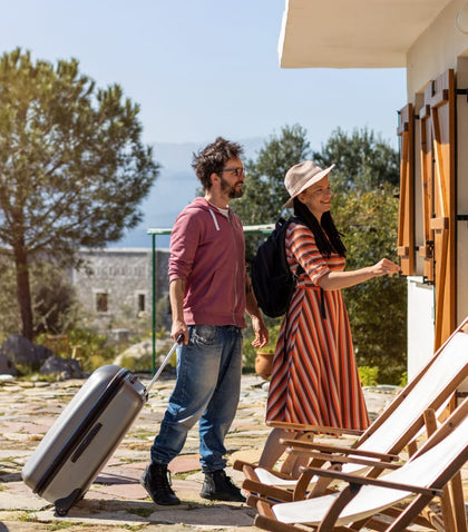 Man and woman unlocking Smart Cabinet Lock for AirBnB security