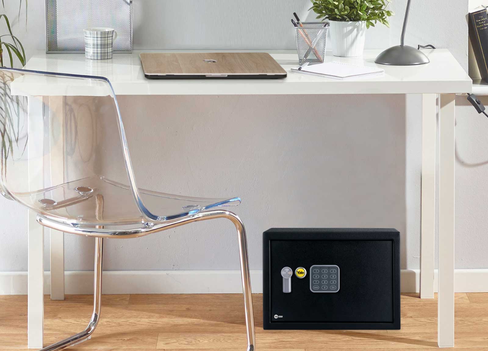 Yale Smart Lock and Apple Homekit Collection ensuring the security of a safe under a desk 